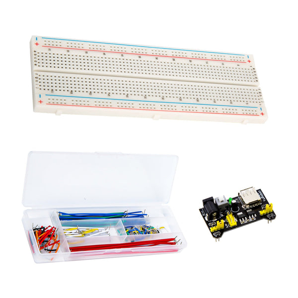 Breadboard project kit showing the breadboard, power supply module, and jumper wires together.