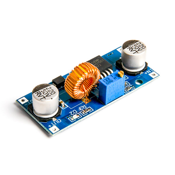 XL4015 adjustable DC-DC step-down module showing coil, capacitors, and blue potentiometer on blue PCB