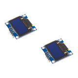 Two SSD1306 0.96-inch blue I2C OLED display modules with 4-pin headers, shown unpowered on a white background.