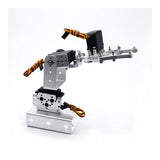 Assembled 3DOF metal robot arm with three servos, silver base and gripper, front angled view