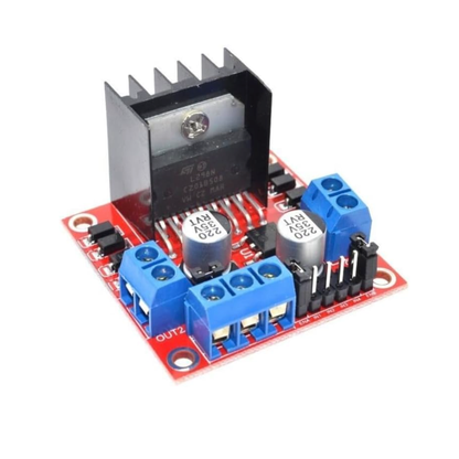 Close-up of ShillehTek L298N Motor Driver Board with heat sink and blue connectors