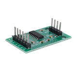 Side angled view of HX711 load cell amplifier module showing pins and circuit