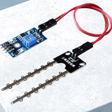 ShillehTek soil moisture sensor module connected to probe with Dupont cable