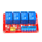 Top view of ShillehTek 4-channel 24V relay module with four blue relays