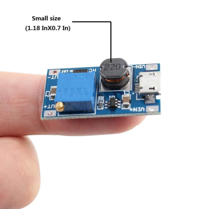 Small ShillehTek MT3608 DC-DC step up booster held on fingertip