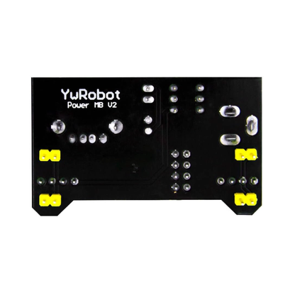 Bottom side of ShillehTek MB102 power supply board showing solder joints and jumpers