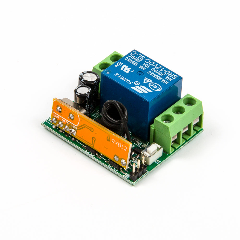 Alternate bottom view showing solder points and green terminal connectors for relay module