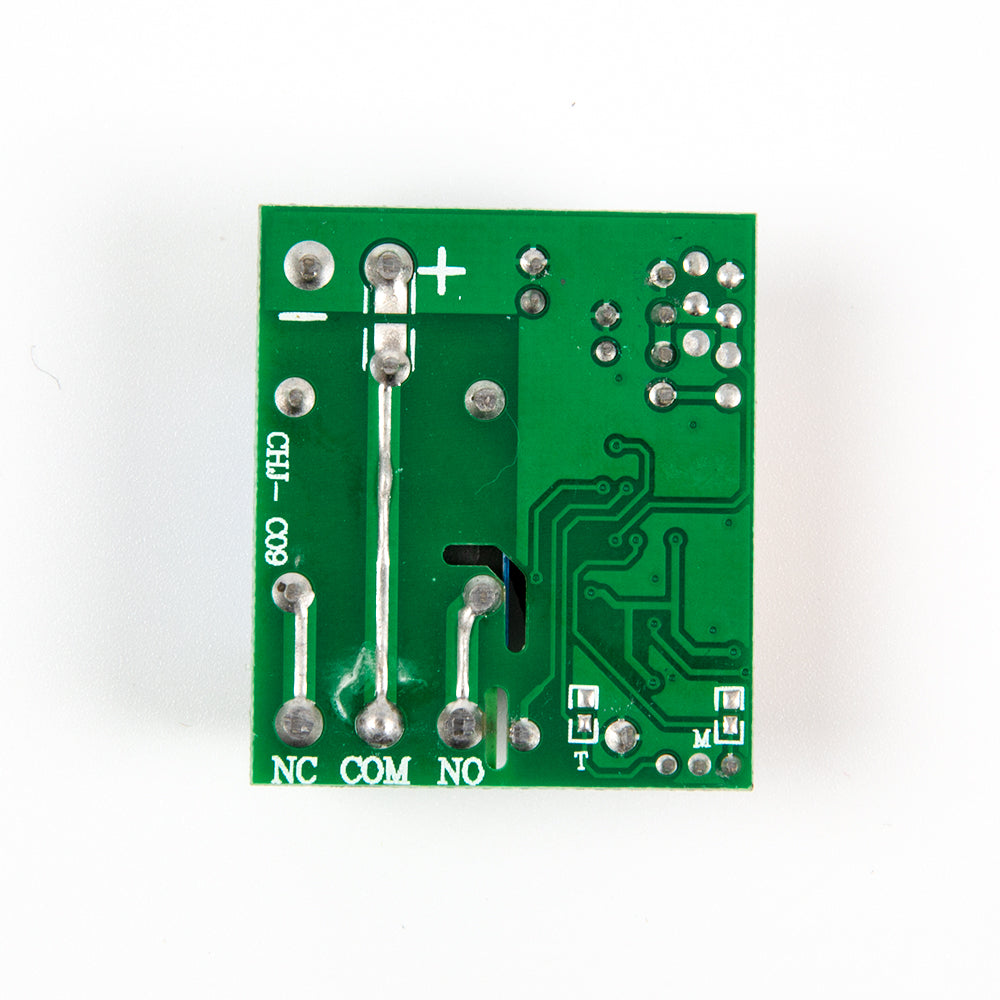 Top angle showing exposed relay and antenna on 12V single channel wireless module