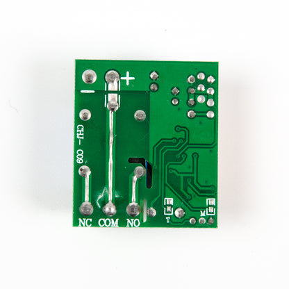 Top angle showing exposed relay and antenna on 12V single channel wireless module