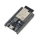 Close-up angled view of ESP32-DevKitC-VE board with pins and USB port visible