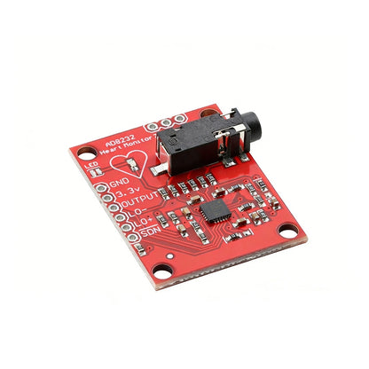 Closeup of red AD8232 ECG heart rate sensor module with output jack