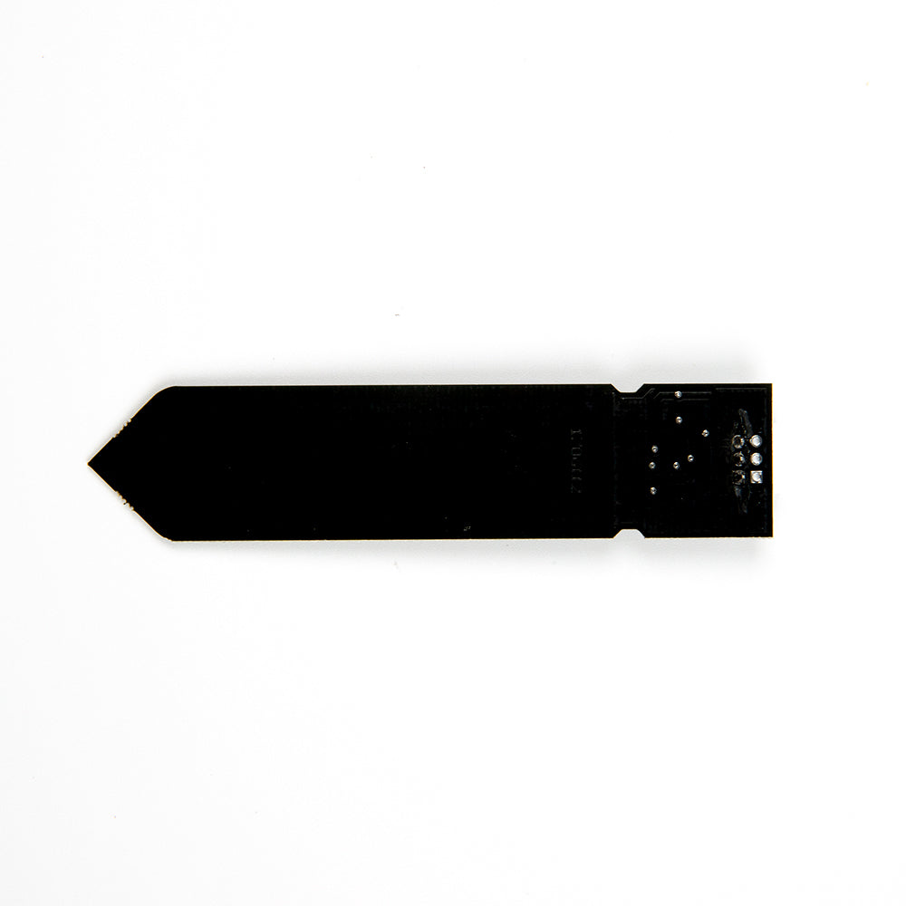 Back side view of Capacitive Soil Moisture Sensor V1.2 showing black PCB and solder points