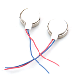 Two flat coin vibration motors with red and blue wires for Arduino Raspberry Pi and ESP32 projects