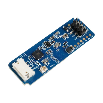 Close-up of HLK-LD2450 24GHz mmWave radar sensor module showing pins and electronic components