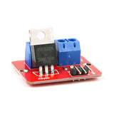 IRF520 MOSFET driver module with blue terminal blocks and black MOSFET chip on red PCB