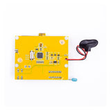 Back side of LCR-T4 transistor tester circuit board with components and battery clip attached