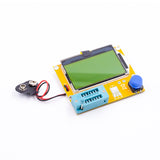 LCR-T4 transistor tester with LCD screen, blue test socket, and battery clip on white background