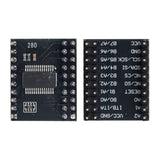 MCP23017 I2C 16-bit I/O port expander showing chip and labeled pin headers for Arduino and ESP32