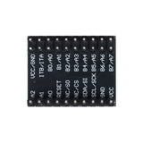 Close-up of MCP23017 I2C port expander showing labeled pin headers for Arduino Raspberry Pi ESP32