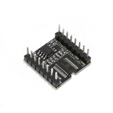 Close-up of MP3-TF-16P mini MP3 player module showing pin headers and integrated circuits