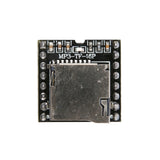 Close-up of MP3-TF-16P mini MP3 player module showing TF card slot and surrounding components
