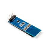 Back side of SSD1306 0.91 inch 128x32 I2C OLED display module showing PCB and pin headers