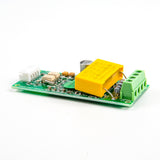 PZEM-004T AC energy meter and power monitor module showing yellow capacitor and green terminal block