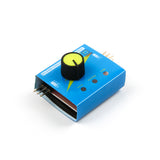 Compact blue RC servo tester and CCPM consistency checker with a yellow and black control knob