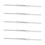 Five normally open reed switches with glass capsules and complete metal leads, arranged in separate rows.