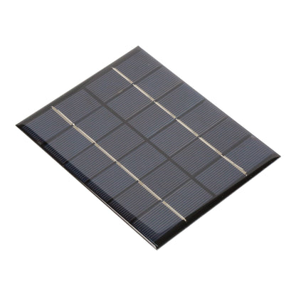 Close-up angled view of 110x136mm 6V 2W solar panel showing solar cells and protective coating