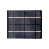 Close-up view of 110 x 136mm 6V 2W solar panel with visible solar cells and grid lines