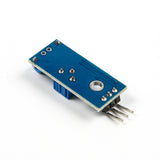 Back side view of SW-420 vibration sensor module showing solder points and three-pin connector for Arduino