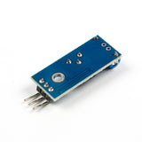 Back side view of SW-420 vibration sensor module showing solder points and pin connectors for Arduino