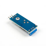 Back side of SW-420 vibration sensor module showing solder points and blue PCB for Arduino projects