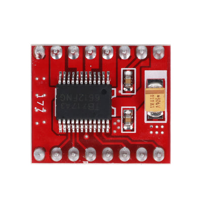 Close-up of TB6612FNG motor driver chip and soldered pins on red PCB for Arduino and ESP32