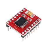Close-up of TB6612FNG pre-soldered dual motor driver module with pins and components on red PCB