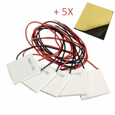 Five TEC1-12706 thermoelectric peltier cooler plates with red and black wires and thermal pads