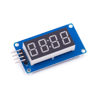 TM1637 4-bit red LED display module showing digital clock digits on blue PCB with 4-pin connector