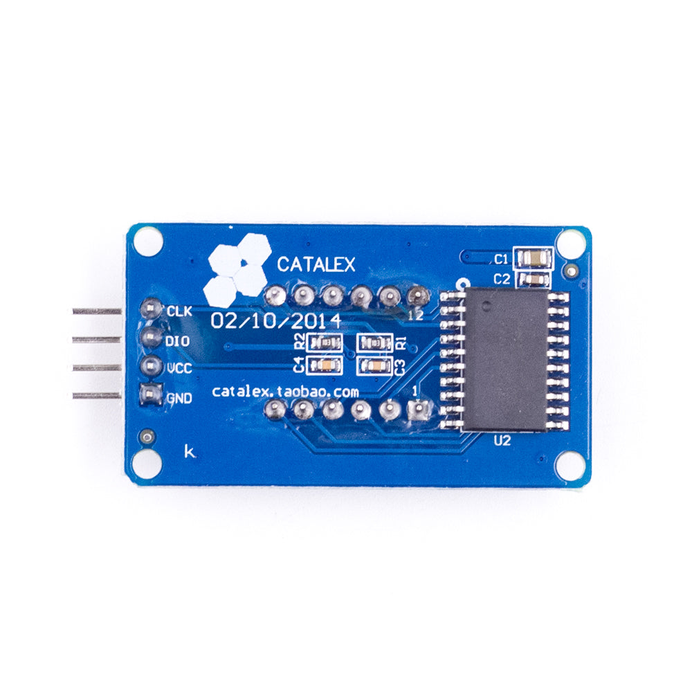 Back side of TM1637 4-bit red LED display module showing circuit board and pin labels