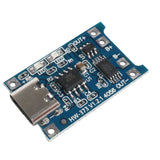 Close-up of TP4056 1A LiPo battery charging board with Type-C port and current protection circuitry