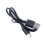 Black USB-C to USB-A cable neatly tied with twist tie Black USB-C Cable 2A 0.5m