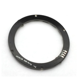 Back side of WS2812 16-LED RGB ring with black PCB and connection pads visible