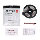 WS2812B LED strip roll with packaging, wiring connector, and instruction sheets for installation