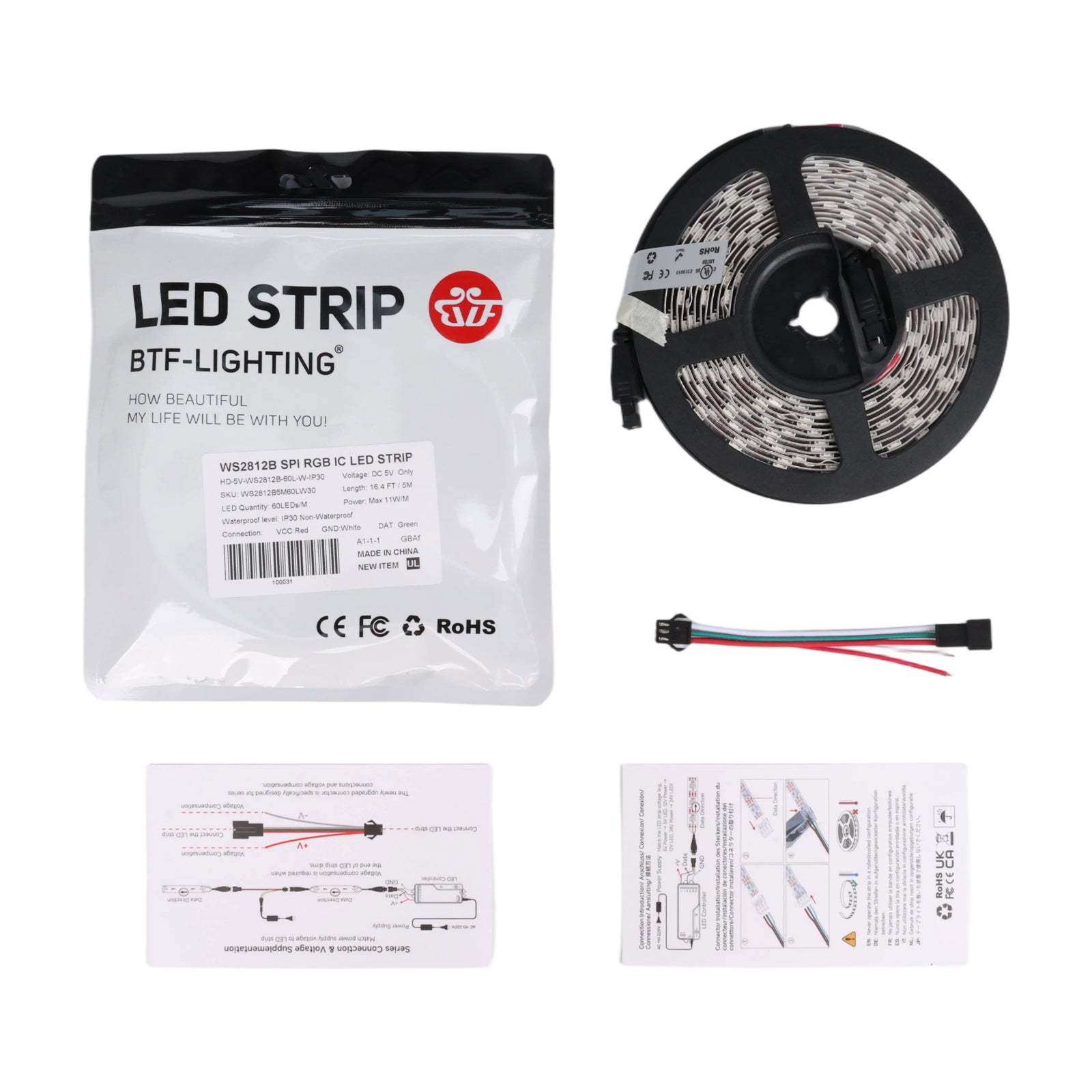 WS2812B LED strip roll with packaging, wiring connector, and instruction sheets for installation
