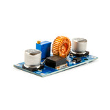 XL4015 adjustable DC-DC step-down module showing coil, capacitors, and blue potentiometer on blue PCB
