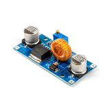 XL4015 adjustable DC-DC step-down module showing capacitors, inductor coil, and blue potentiometer