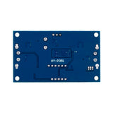 Back side view of XL4015 adjustable DC-DC step-down module with solder points and circuit traces