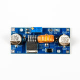 XL4015 adjustable DC-DC step-down module with capacitors, coil, and potentiometer on blue PCB