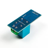 ZMPT101B AC single-phase voltage sensor module showing the back side with pins and blue transformer